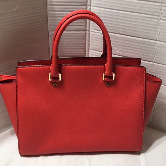 Michael kors satchel with crossbody strap and gold tone hardware. EUC - Picture 2 of 10